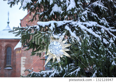 Decorated Christmas tree in Old Riga, Latvia. 132128947