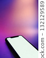 Vertical banner of mobile phone with bright isolated screen on neon background 132129589