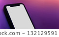 Smartphone mock up with white blank screen on vivid neon tones background 132129591