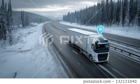 Truck transporting goods through snowy landscape on a highway during winter Truck transporting goods through snowy landscape on a highway during winter 132131040