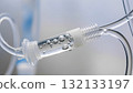 Close-up of a medical IV line with air bubbles. Medical equipment. 132133197