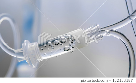 Close-up of a medical IV line with air bubbles. Medical equipment. 132133197