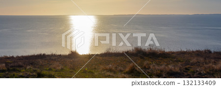 Panoramic view of the coast of the Cape Cod Peninsula at sunset 132133409