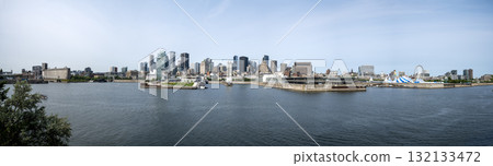 Panoramic view of Old Montreal along the St. Lawrence River in summer Panoramic view of Old Montreal along the St. Lawrence River in summer 132133472