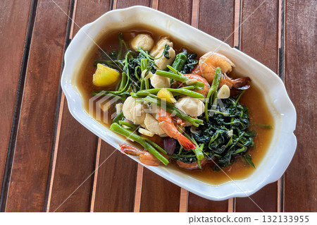 Adobong Kangkong Filipino hot salad with spinach, vegetables, and shrimp Adobong Kangkong Filipino hot salad with spinach, vegetables, and shrimp 132133955