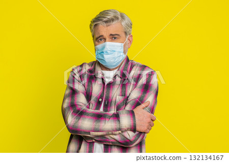 Mature man wearing medical mask on face protection safety allergy flu pneumonia virus disease asthma 132134167