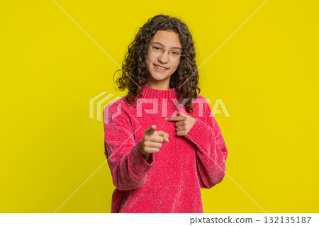 Smiling happy girl pointing forward to camera, choosing lucky victory winner, indicating, promotion Smiling happy girl pointing forward to camera, choosing lucky victory winner, indicating, promotion 132135187