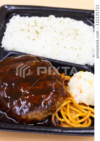 A delicious hamburger bento with potato salad and Neapolitan pasta as side dishes A delicious hamburger bento with potato salad and Neapolitan pasta as side dishes 132135722