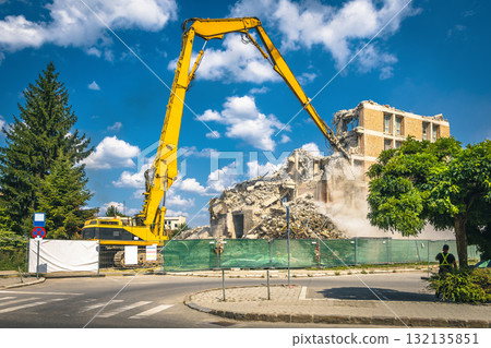 Demolition of a ruined house using building hydraulic shears Demolition of a ruined house using building hydraulic shears 132135851