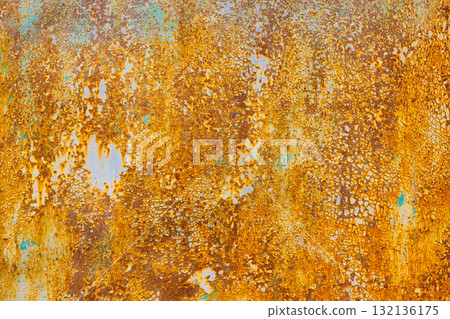 Extensively rusted metal with peeling white paint 132136175