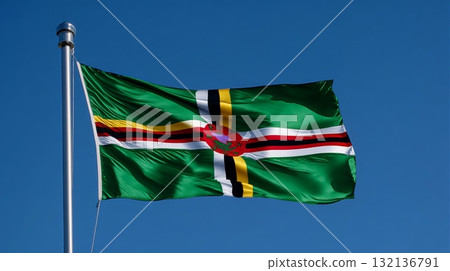 Celebrating Lithuanias independence day with the national flag waving proudly against a clear blue sky 132136791