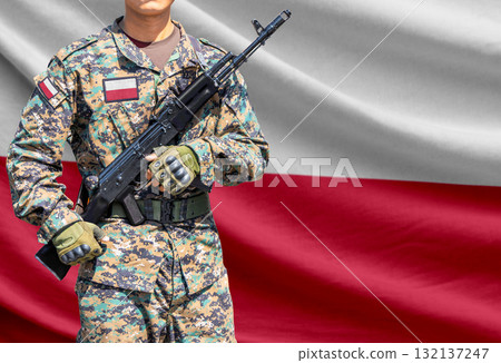 Poland flag with soldier holding assault rifle Poland flag with soldier holding assault rifle 132137247