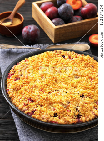 Crumb topped Plum Pie in a baking dish Crumb topped Plum Pie in a baking dish 132137254