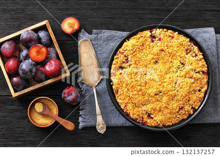 Crumb topped Plum Pie in a baking dish Crumb topped Plum Pie in a baking dish 132137257