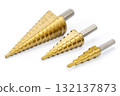 Three Metal Step Drill Bits in Various Sizes on White Background 132137873