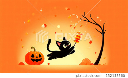 Playful black cat chasing candy corn, warm orange tone, blank sky space. 132138360