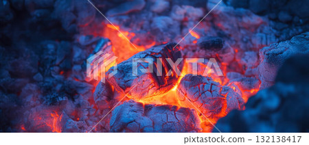 Intense red and orange flames dance against a dark backdrop, showcasing their power and beauty. Intense red and orange flames dance against a dark backdrop, showcasing their power and beauty. 132138417