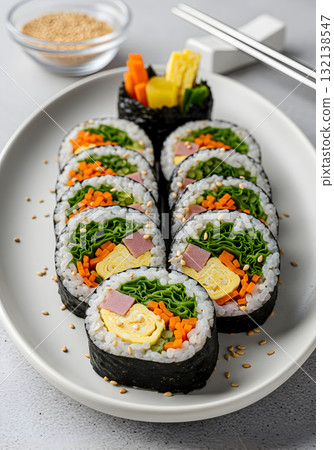 Korean Gimbap (Kimbap) Rice Rolls with Egg, Vegetables, and Sausage 132138547