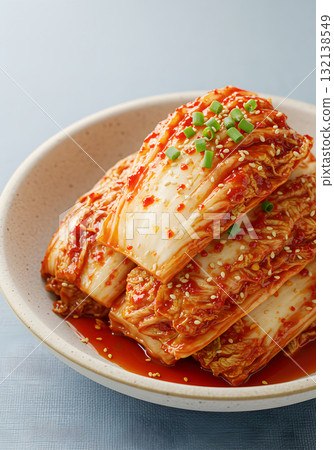 Kimchi with Sesame and Scallion in Ceramic Bowl 132138549