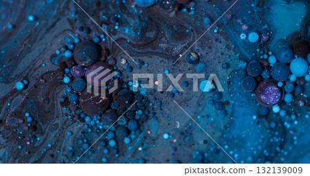 Oil stream. Bubble fluid. Defocused blue purple color round glitter paint acrylic wet texture floating on abstract vibrant background. Oil stream. Bubble fluid. Defocused blue purple color round glitter paint acrylic wet texture floating on abstract vibrant background. 132139009