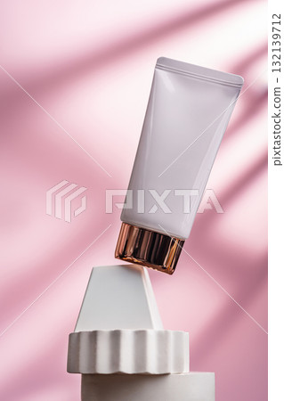 Moisturizing sun cream on pink background 132139712