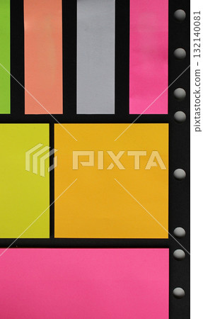 Colorful Note Stickers and Page Index Stickers on a Perforated Holder Tab Stock Photo for Vertical Stationery Backgrounds 132140081
