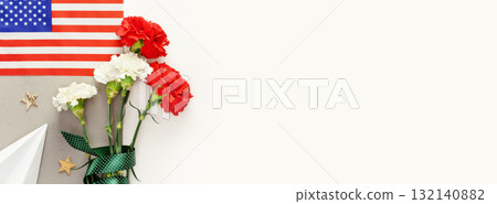 Holiday banner with carnations, American flag, paper plane and place for text. Banner suitable for National Aviation Day in USA, celebrated in August and U.S. Air Force Birthday, September 18 132140882