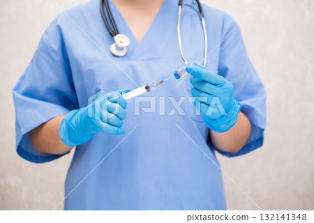 Girl in Blue Veterinarian Suit 132141348