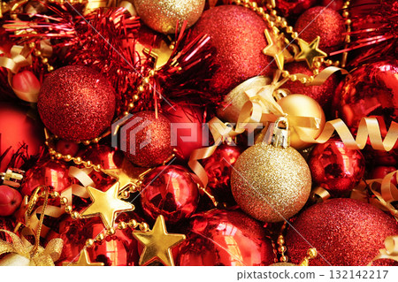 Golden and red balls, stars and berries background; festive Christmas and New Year celebration card, selective focus, shallow DOF 132142217