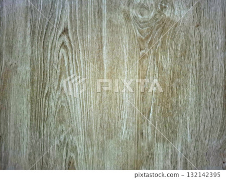 A close-up view of a light wood surface reveals intricate grain patterns and textures. The natural look enhances the warmth and beauty of the material, suitable for various design uses. 132142395