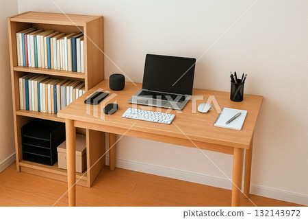 A simple and functional workspace with a laptop and bookshelf 132143972