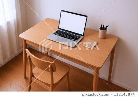 A bright workspace where natural wood desks and white walls harmonize 132143974