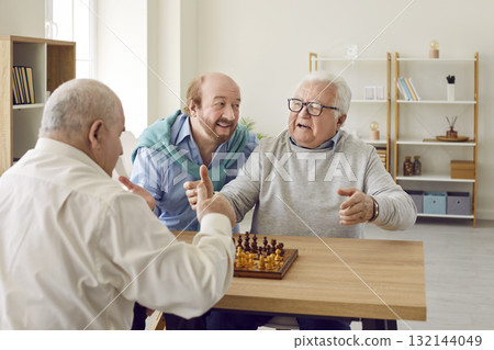 Group of angry senior people having argument during game of chess in retirement home Group of angry senior people having argument during game of chess in retirement home 132144049