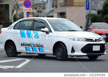 Training vehicle on the road 132144393