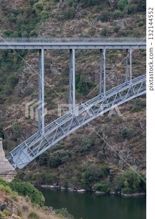 Majestic Steel Bridge Spanning a Rocky Gorge Majestic Steel Bridge Spanning a Rocky Gorge 132144552