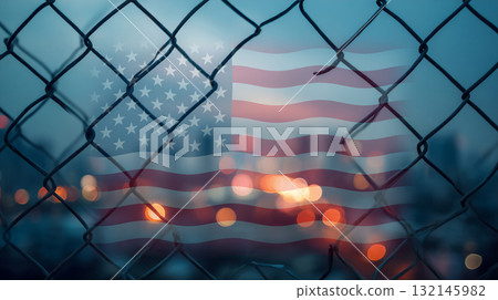 American flags and city lights over the fence — symbols of freedom and boundaries 132145982