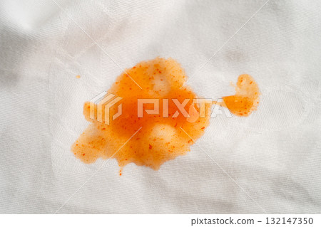 Dirty tomato sauce stain or ketchup on cloth to wash with washing powder, cleaning housework. 132147350