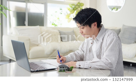 Asian man studying real estate 132147999