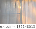 curtain and sunrise 132148013