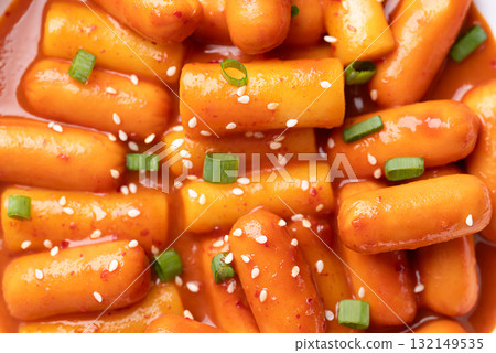 Tteokbokki (simmered rice cake) and sausage with spicy sauce, Korean food Tteokbokki (simmered rice cake) and sausage with spicy sauce, Korean food 132149535