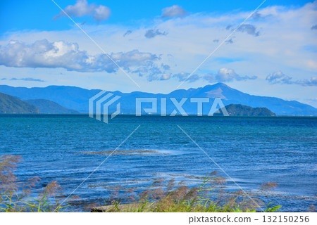 View of Lake Biwa from Imazuhama in Takashima City, Shiga Prefecture, overlooking Mount Ibuki and Chikubushima Island 132150256