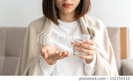 Woman taking medicine 132150510