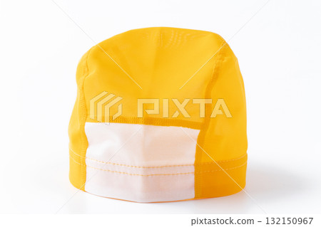 Children's yellow swimming cap on a white background 132150967