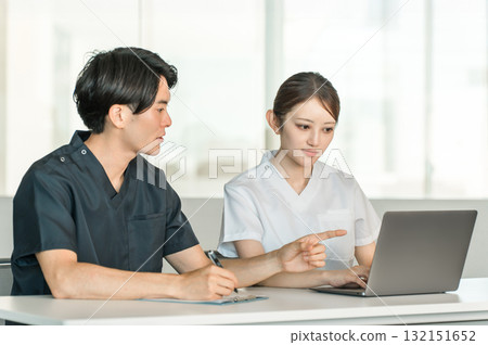 Medical workers in scrubs, medical staff, male doctors and female nurses in white coats Medical workers in scrubs, medical staff, male doctors and female nurses in white coats 132151652