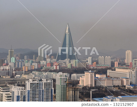 View to the Ryugyong Hotel from the top of the Juche Tower in Pyongyang View to the Ryugyong Hotel from the top of the Juche Tower in Pyongyang 132152907