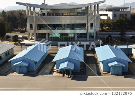 The blue huts of the Joint Security Area (JSA) at Panmunjom between North and South Korea The blue huts of the Joint Security Area (JSA) at Panmunjom between North and South Korea 132152970