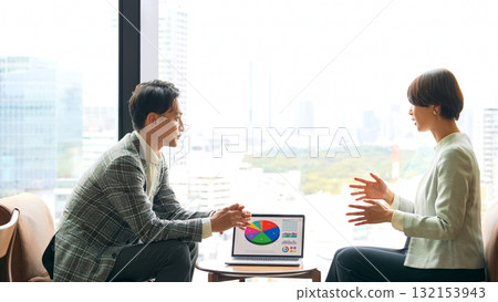 A group of casual business people meeting in a lobby 132153943