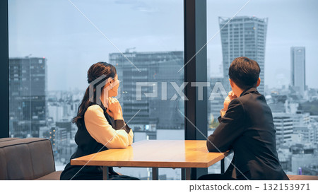 A couple watching the night view from the lounge A couple watching the night view from the lounge 132153971