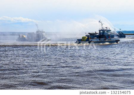 Extinguishing a burning ship during naval exercises 132154075