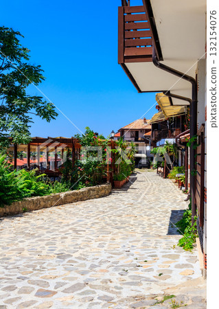 Narrow street of the old town of Nessebar in Bulgaria Narrow street of the old town of Nessebar in Bulgaria 132154076